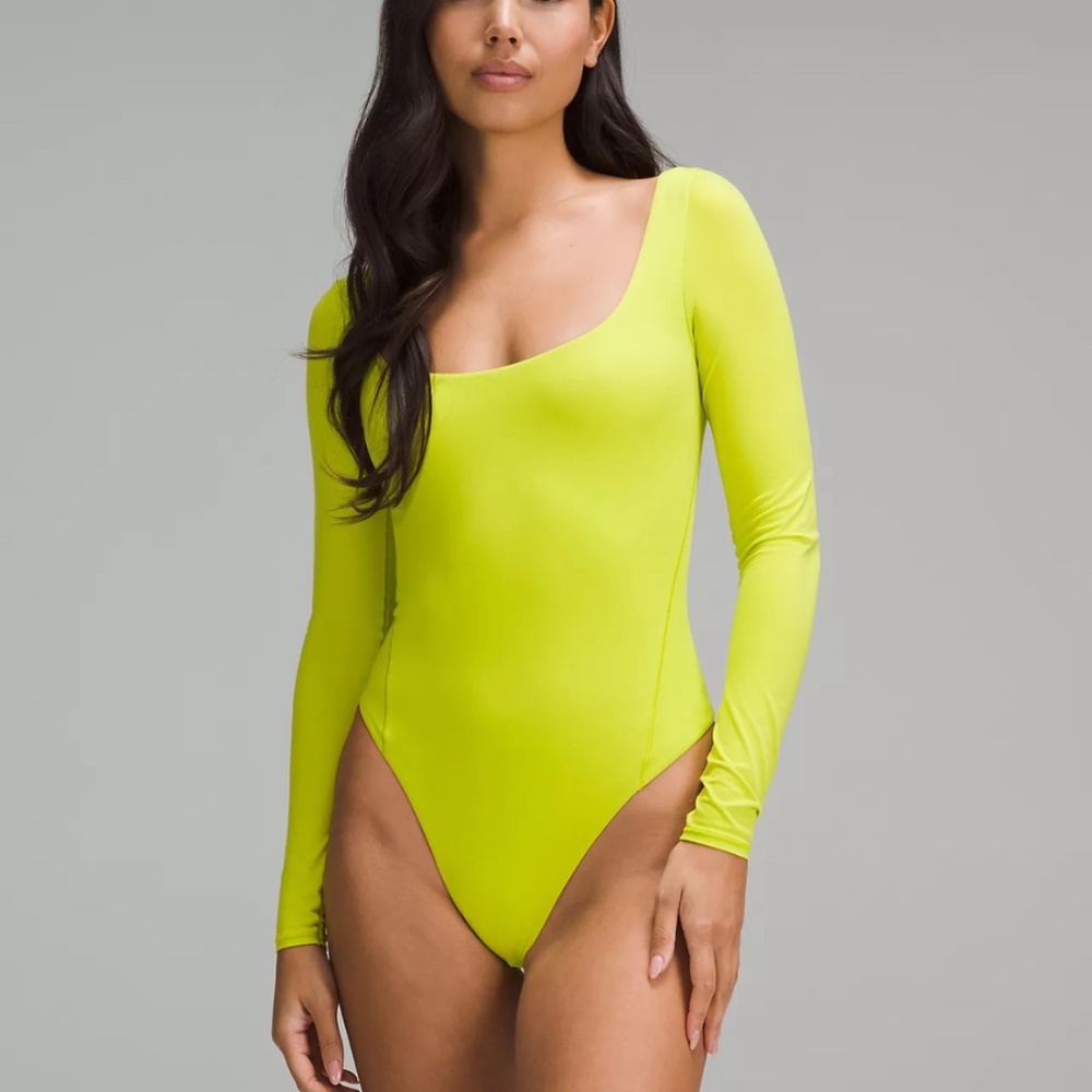 Lululemon Athletica Neon Yellow Bodysuit, no tags, but never used. Bought NWT